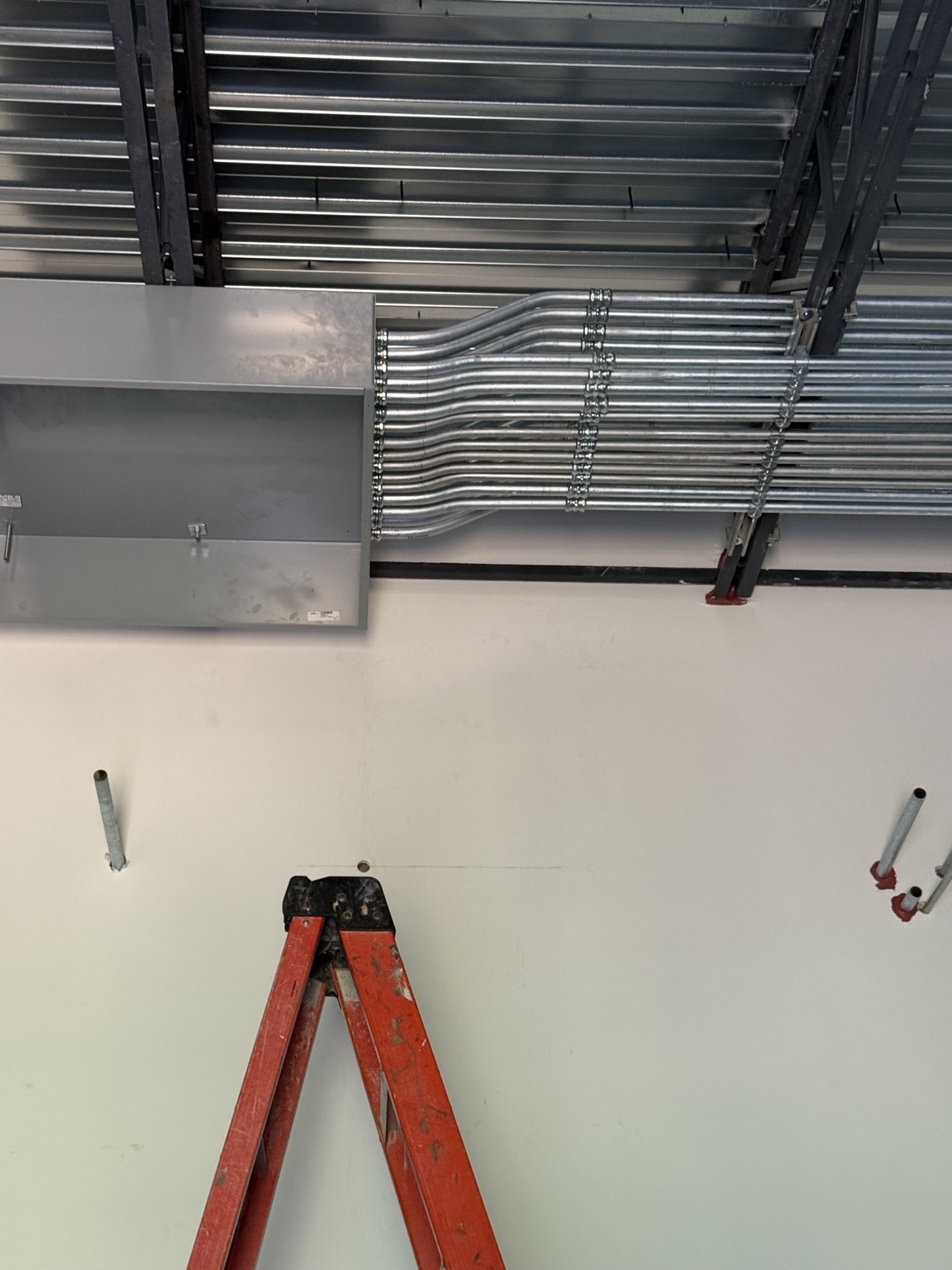 Clean conduit installation and electrical wall setup